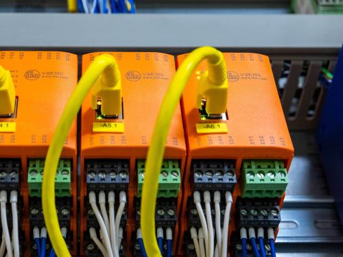 Three evaluation units mounted next to each other in the control cabinet.