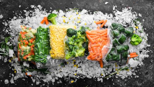 Frozen packaged food on a slate surface