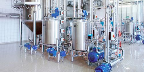 Stainless steel tanks in a food production facility