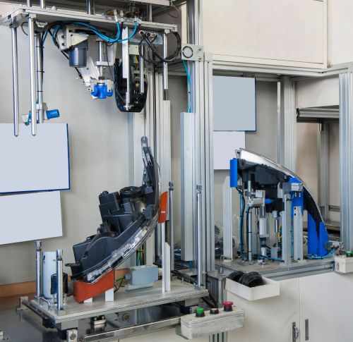 Part on a test bench being checked for leaks.