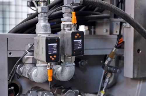 Two SM magmeters installed side-by-side in piping.