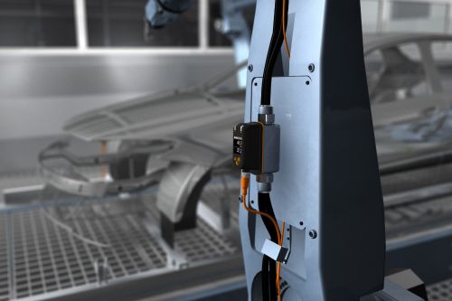 Application photo showing SV vortex meter mounted on a bracket with inflow and outflow pipes